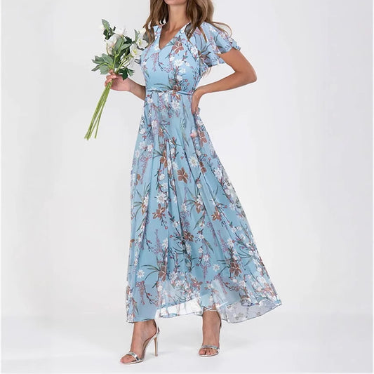 Vestido largo de gasa azul con estampado floral, escote en V y volantes elegantes para mujer.