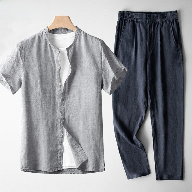 Conjunto de lino para hombre con camisa gris de cuello mao y pantalón azul marino, estilo Tang moderno y transpirable.