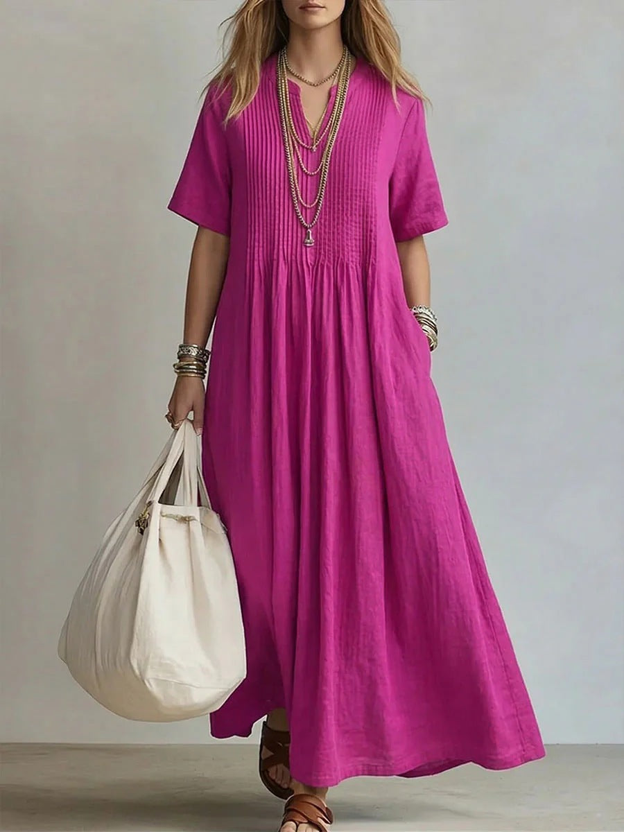 Vestido largo fucsia de algodón y lino con cuello en V, detalles plisados y ajuste holgado casual de ZYVA.